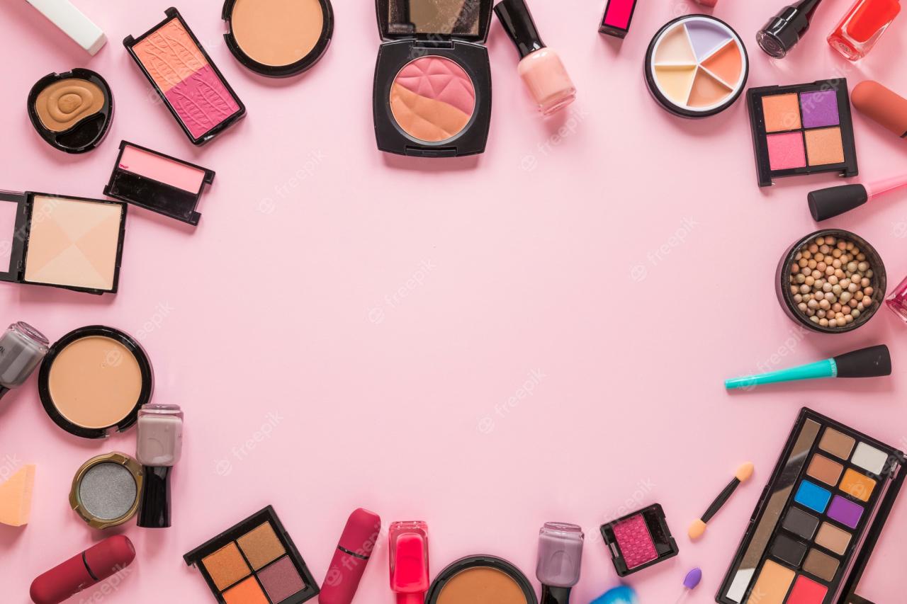 Free Photo | Different cosmetics types scattered on pink table